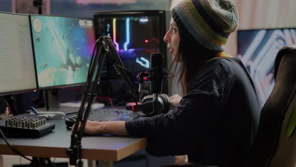 Portrait of Woman Streamer Looking at Camera After Playing Space Shooter alt
