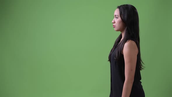 Profile View of Young Beautiful Asian Businesswoman alt
