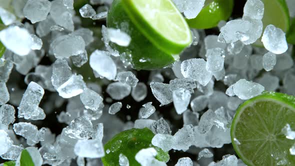 Super Slow Motion Shot of Exploding Crushed Ice Lime and Mint Towards Camera at 1000Fps alt