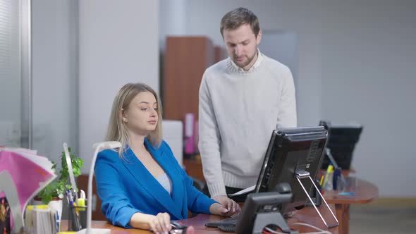 Arrogant Rude Young Woman Ignoring Man in Office alt