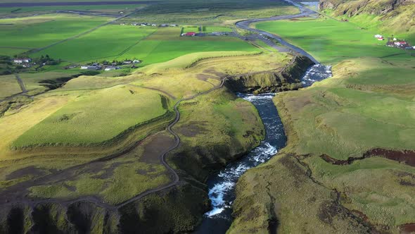 Flying Over Skogar River in Southern Iceland alt