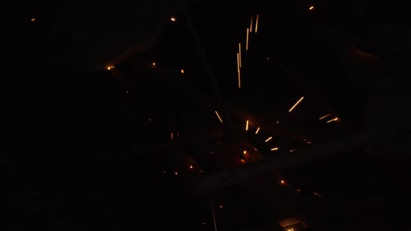 Welder Uses Torch To Make Sparks alt