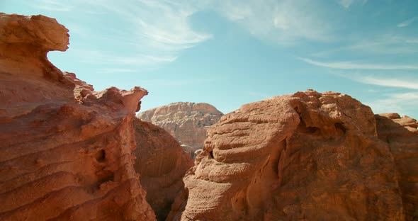 Desert Mountains Seen Through Hole in Rock in Petra Jordan Nature Landscape