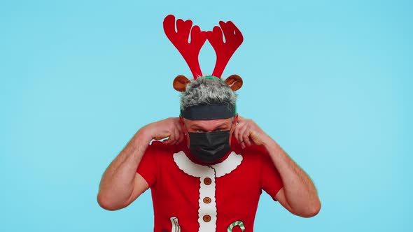 Man in Christmas Red Tshirt Wearing Face Mask Ppe to Safe From Coronavirus on Lockdown Quarantine alt