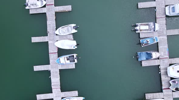 Aerial View of Boats Docked in Bay