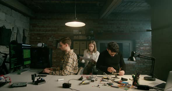 Hero Shot of Team Working on Technology Electronics Startup in Loft Office