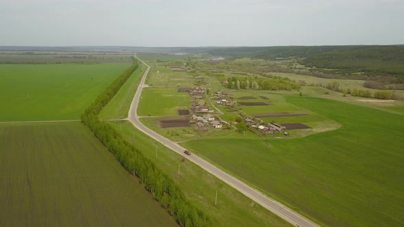 Truck On The Road Near Village