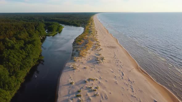 Irbe River Meets Baltic Sea in Latvia Aerial Dron 4K Shot. alt
