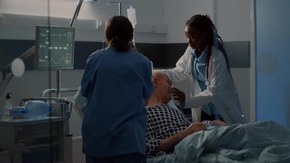 Patient with Breathing Problems in Hospital Ward Bed alt