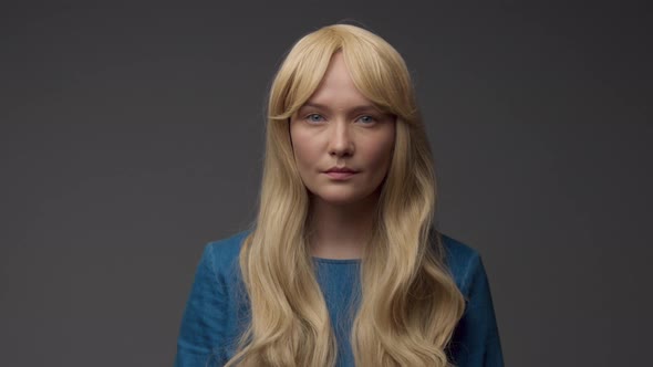 Nordic Blond Model in Studio with Dramatic Top Light alt