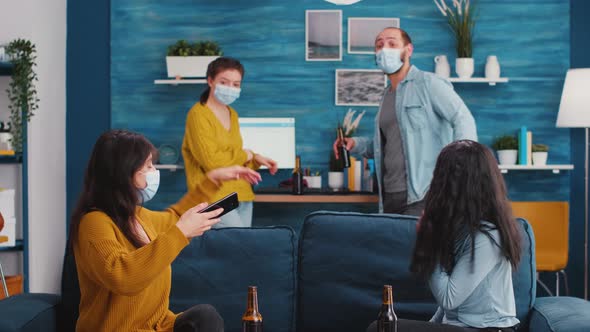 Young People From Diverse Cultures Taking Selfie Wearing Face Masks alt