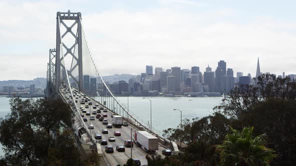 Static shot of Oakland Bay Bridge and cityscape view of San Francisco, California alt