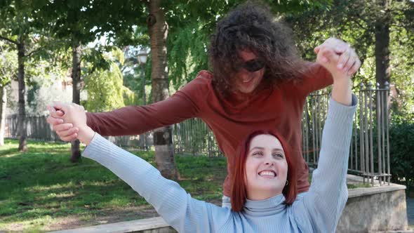 dance with your arms - man makes his friend with paraplegia dance with her arms alt