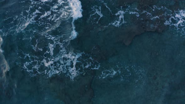 Foaming and Splashing in the Sea at Night  alt