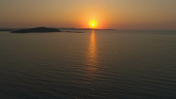 Big Orange Sun Creating Sun Path in the Sea Surface alt