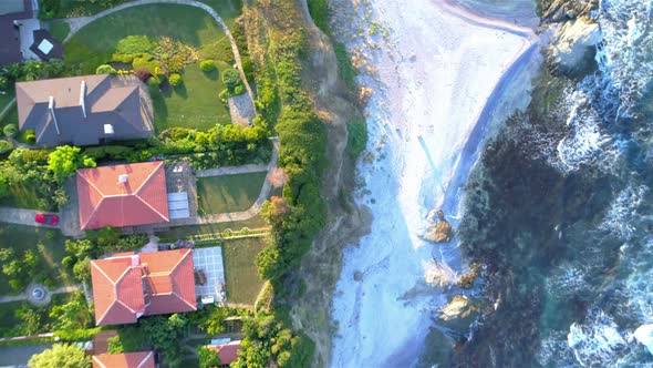 Amazing Top View of Seacoast with Houses alt