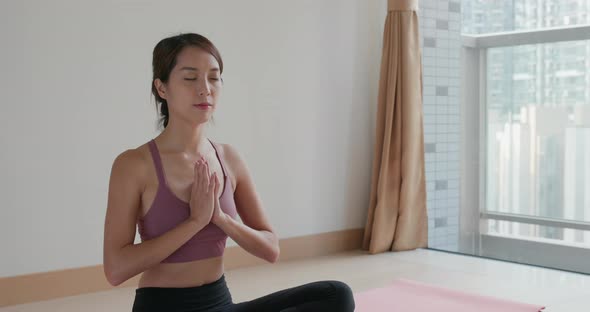 Woman do yoga at home