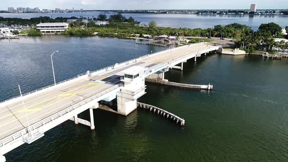 Bikers Peddle Across the John Ringling Parkway Bridge in Sarasota, Florida. alt