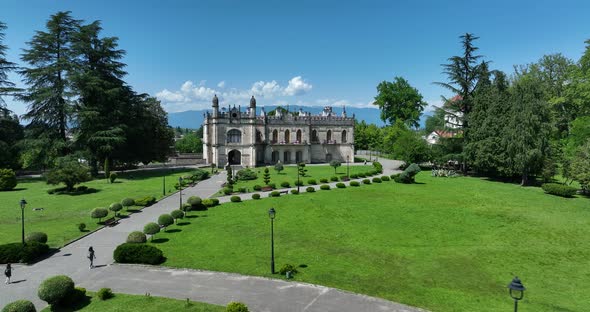 Zugdidi, Georgia - May 30 2022: Aerial view of Dadiani Palace in the center of Zugdidi city alt