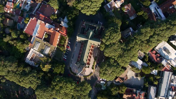 Aerial top down shot descending over San Isidro Cathedral spire in Greater Buenos Aires alt