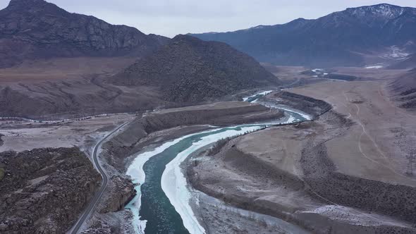 Partly Frozen River Among Altai Mountains