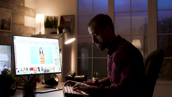 Professional Photographer Retouching Portrait at Night in Home Office alt
