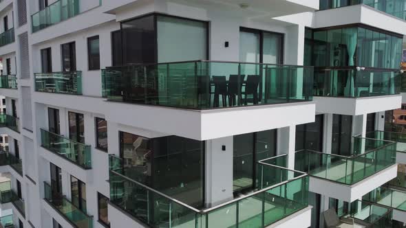 CloseUp Aerial Drone View of Beautiful Contemporary Residential House on First Beach Line alt