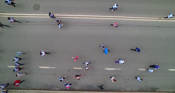 Aerial View of People Running a Marathon