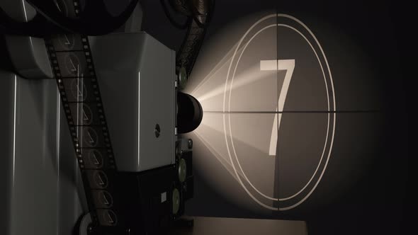 Movie Projector Against Cinema Screen and Light Rays Projected Video alt