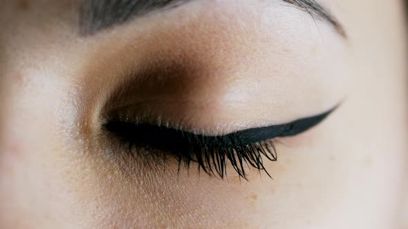 Eye Iris Contracting, Pupil Dilation of Woman Green Eye alt