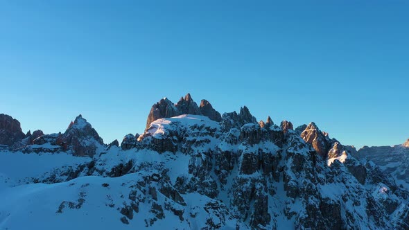 Cadini Di Misurina Mountains at Winter Sunrise alt