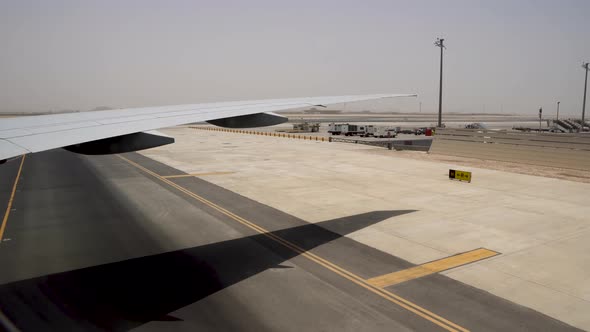 Airport in the Hot Desert in the Daytime. Airstrip with Yellow Markings 