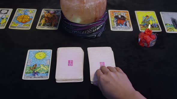 Fortune Teller Using Tarot Cards On A Black Table 08