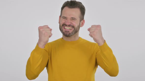 Portrait of Excited Middle Aged Man Celebrating Success alt