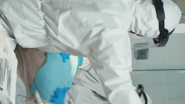 Vertical Video Woman at Dentist While Treatment Process in Coronavirus Pandemic alt