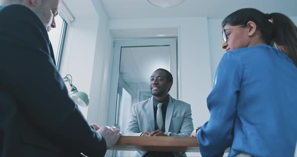 Multi-ethnic business people during job interview in the office alt