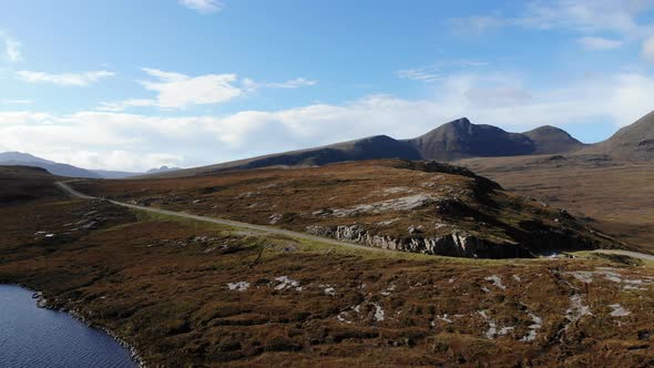 A slow flight over the nc500 towards scottish mountains alt