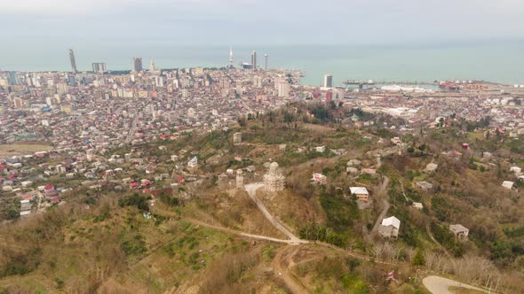 Aerial hyperlapse of beautiful church on top of the mountain in Batumi alt