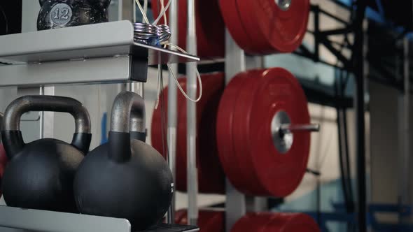 Man Macro Close Up Lifts a Weight of 16 Kilograms alt