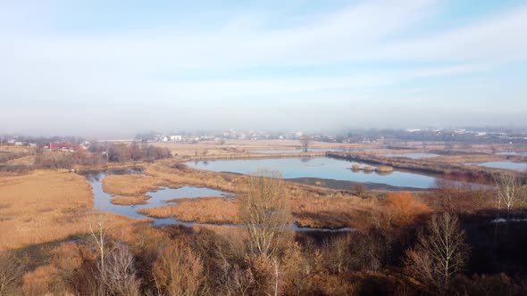 Aerial Drone View Flight Over Artificially Created Lakes for Breeding Fish alt