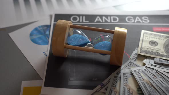 Close Up Shot of a Stock Market Graph with Hundred Dollars Banknote alt