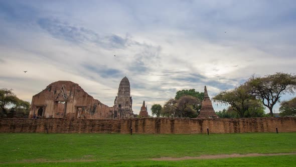 day to night Time-lapse of Ruins of Wat Ratcha Burana temple in Ayutthaya historical park, Thailand