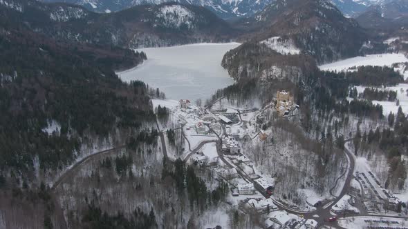 Alpsee Lake in Mountains in Winter Day. Bavarian Alps, Germany. Aerial View alt