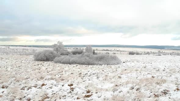 Magical winter moorland in ascending drone shot alt