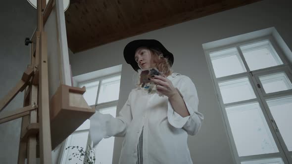 Artist Painting On Canvas alt