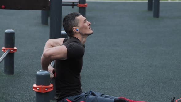 Man training outdoors on sports field