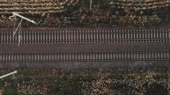 Aerial View of Railway Track Among Agricultural Fields alt