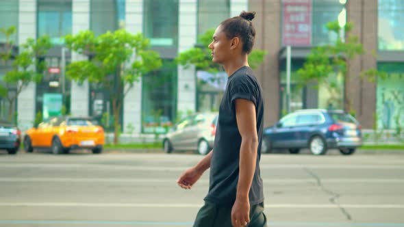 Casual Trendy Guy Going on the Street alt