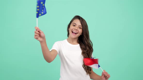 Happy Child Waving European Union and French Flag on Blue Background France Vacation alt