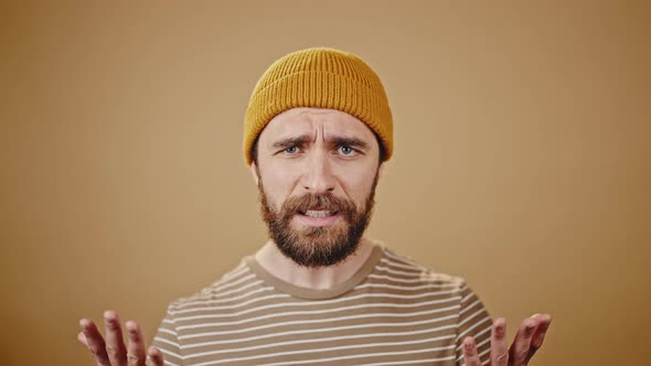 Middleaged Cast Member Looks Unsatisfied of Results Closeup alt